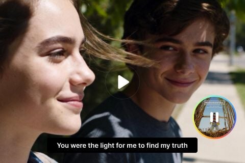Singing portrait with lyric-style text.